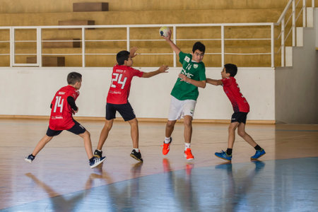 Afife, Viana do Castelo, Portugal - November 13, 2021: AD Afifense player in action against Vermoim, game counting for the Intantis Tournament organized by Afifense in handball on February 13, 2021のeditorial素材