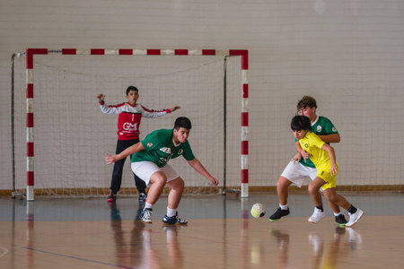 Afife, Viana do Castelo, Portugal - November 13, 2021: AD Afifense player in action against Vermoim, game counting for the Intantis Tournament organized by Afifense in handball on February 13, 2021のeditorial素材
