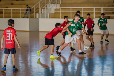 Afife, Viana do Castelo, Portugal - November 13, 2021: AD Afifense player in action against Vermoim, game counting for the Intantis Tournament organized by Afifense in handball on February 13, 2021のeditorial素材