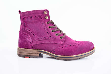 Male purple leather boot on white background, isolated product. Differentiated footwear and exclusive design.の写真素材