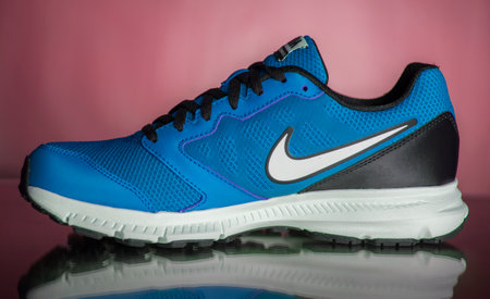 Portugal, August 20, 2022:Nike Sneaker Running. Nike, Multinational company. Isolated on black. Product shots.のeditorial素材