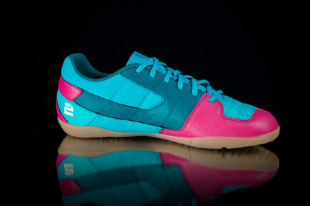 Portugal, September 28, 2022:Nike Sneaker soccer. Nike, Multinational company. Isolated on black. Product shots.のeditorial素材