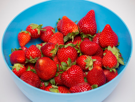 Detail of ripe organically grown strawberries looking great isolated.の写真素材
