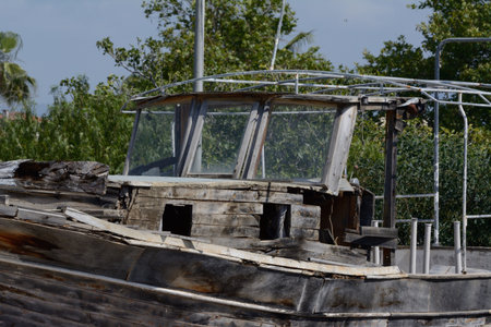 An old wooden boat left to rotの写真素材