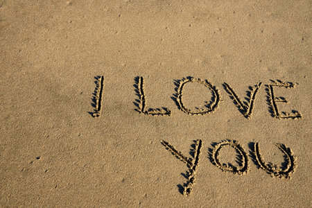 message of love written on sand