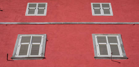 windows on a red backgroundの写真素材