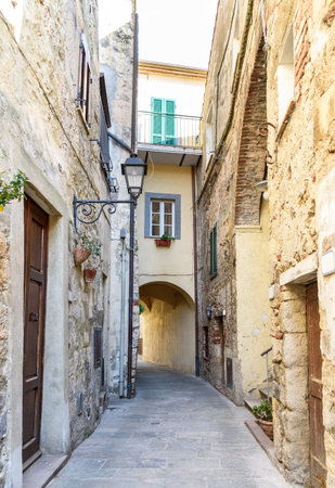 alley street in the village of Capalbio, tuscany, italyの写真素材