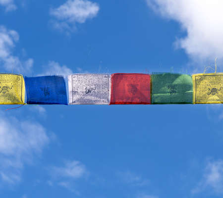 Prayer flag on sky backgroundの写真素材