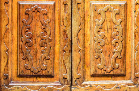 Detail of an antique wooden door with inlayの写真素材