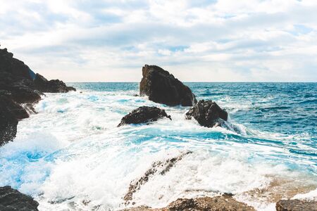 Tidal wave Manarola, village of Cinque Terre, Italy.の写真素材