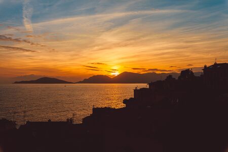 Rare sunset at the beach of Italyの写真素材