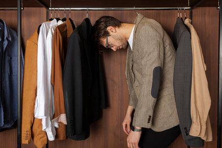 A man on a hanger in a wardrobe.の写真素材