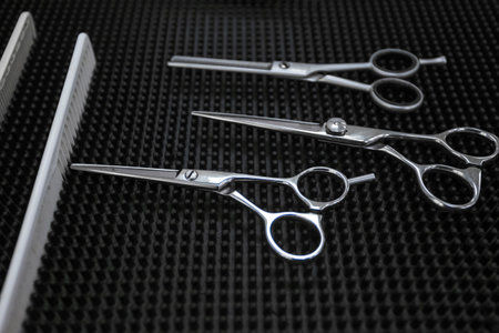 Close-up. set of hairdresser or barber tools lying on a table.の写真素材
