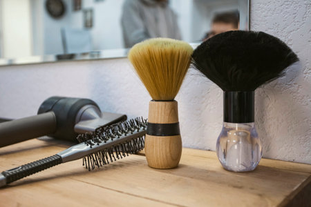 Close-up. set of hairdresser or barber tools lying on a table. brushes.の写真素材