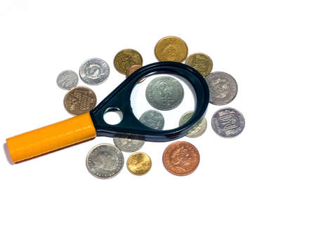 coins & a magnifier の写真素材