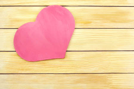 Heart on the background of wooden slats の写真素材