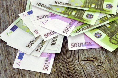 Euro money image on the background wooden boards