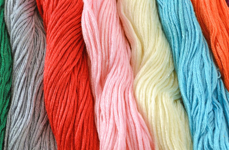 Colored threads for embroidery cross on canvas