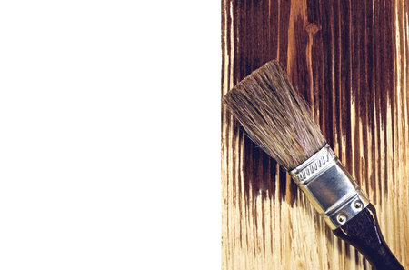 Brush lying on the painted wooden board