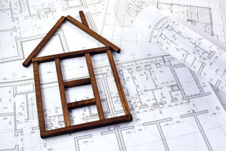 House made of wooden boards and project drawingsの写真素材