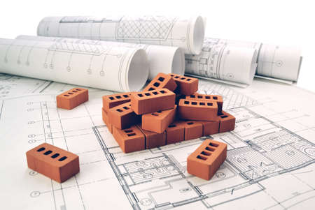 Bricks for building a house with design drawingsの写真素材