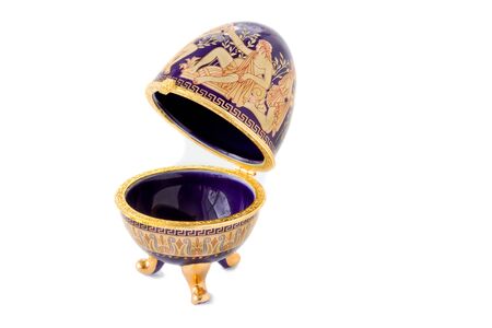 Casket in the form of an Easter egg with an ornament の写真素材