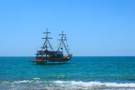 A small sailing vessel for sea trips near beach resortの写真素材
