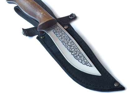 Large, beautifully decorated with a hunting knife and black case for a knifePresented on a white...