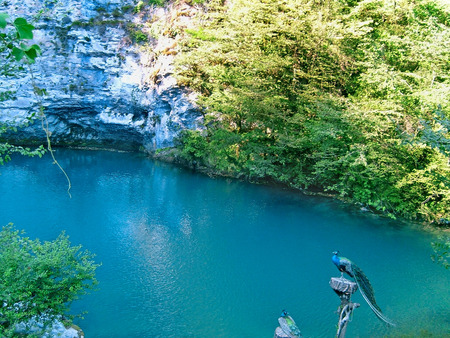 
The lake in the mountains which water has bright blue color because of which it called "The blue lake".の写真素材