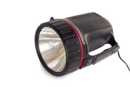 Comfortable small battery electric torch orange. Presented on a white background.の写真素材