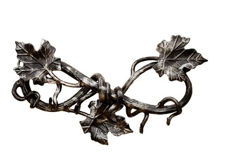 The branch of grapes with leaves, forged from metal. Presented on a white background.の写真素材
