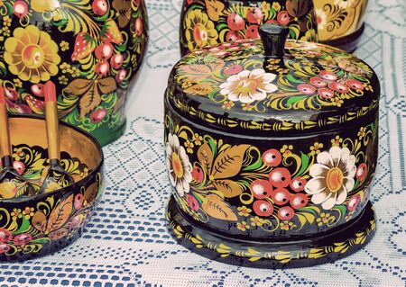 The storefront presents for sale wooden utensils with a beautiful painting in the traditional style , handmade.の写真素材