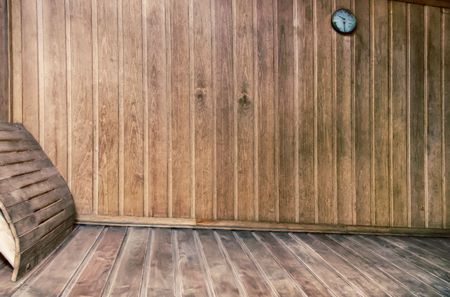 The interior of a small Finnish sauna with wooden walls.の写真素材
