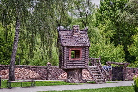 On motives of fairy tales in the children's Park built a house with a fence and gate, next to the characters of fairy tales.の写真素材