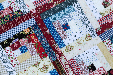 A fragment of the curtain of scraps of fabric, beautiful hand-picked. Handmade.の写真素材