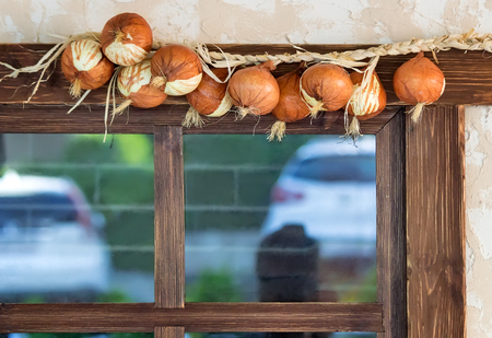 Outside above the window, there is a bow as part of the interior.の写真素材