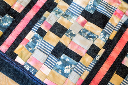 Close-up of a part of women's bags made from scraps of fabric in patchwork. Handmade.