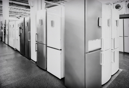 Appliances the store presents for sale a large selection of modern fridges different models.の写真素材