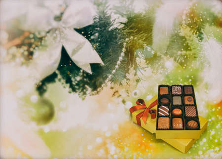 Christmas greeting: on the background of Christmas tree ornaments and gifts. 3D rendering.の写真素材