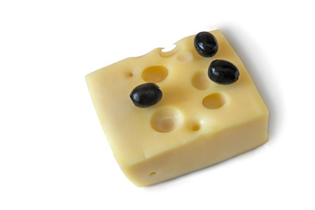 Cheese and olives on a white background.の写真素材