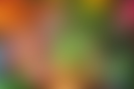 Blurred background image in soft red and green colors.の写真素材