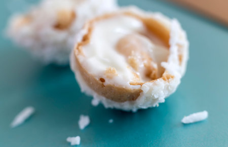 Delicious candy with cream filling and nuts inside. Submitted close-up.の写真素材