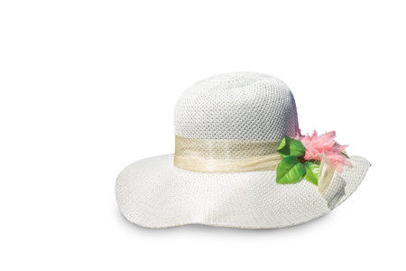 Women summer hat with large brim, decorated with a bow, to protect from the sun. Presented on a white background.の写真素材