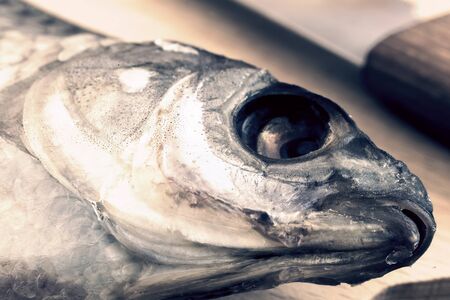 On the table on the cutting Board dried roach. Presented close-up.の写真素材