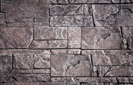 A fragment of wall covered with ceramic tiles