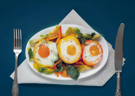 Baked bell pepper with egg inside the pepper