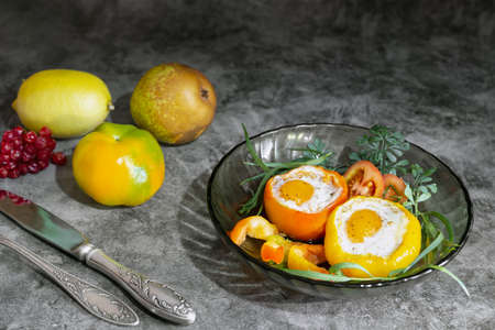 Baked bell pepper with egg inside the pepperの写真素材