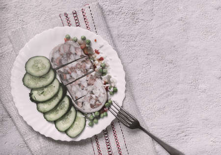 Meat appetizer: pork stomach stuffed with meat and lard.の写真素材