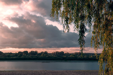 Evening landscape: sunset over a small river