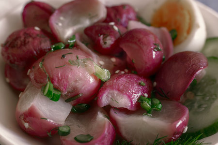 Baked radish with green onion and dillの写真素材